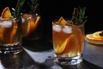 Orange rosemary bourbon cocktail in low key