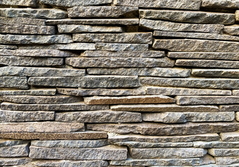 Rough wall made of crushed stone.