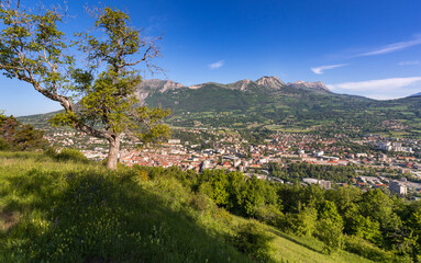 Fototapeta na wymiar The City of Gap (capital of Hautes-Alpes department) in summer with view on Charance mountain. French Alps, France
