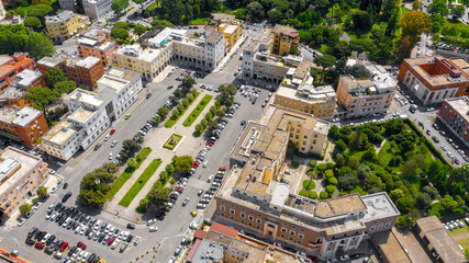 Aerial view of Piazza Libertà in the historical center of Latina, Lazio, Italy. In this square is located the Government Palace, now the Prefecture building, symbol of fascist rationalist architecture