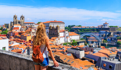 Woman tourist enjoying panoramic view of porto city landscape view- Portugal