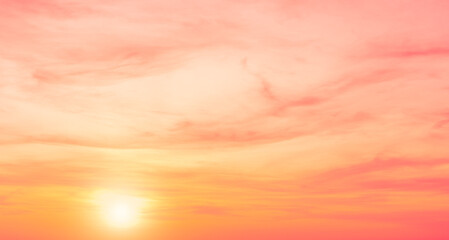 Sunset sky in the morning with pink, yellow, orange sunrise, Romantic horizon nature sky clouds background 