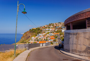 Natural Madeira landscape at the settlements built on high cliffs or in the hillsides rising...