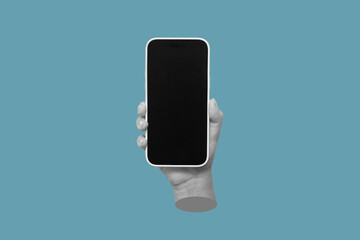 Mobile phone with black screen in female hand isolated on blue color background. Blank with empty copy space for text. Trendy creative collage in magazine urban style. Contemporary art. Modern design