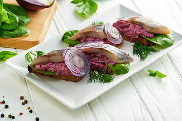Bruschetta with herring and beet. Ukrainian cuisine