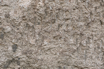 Rough textures on a white wall, the surface is uneven.