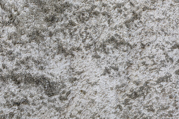 Rough textures on a white wall, the surface is uneven.