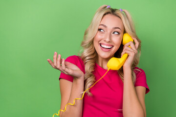 Portrait of youngster pretty blonde curly hairstyle lady talking retro wired telephone conversation...