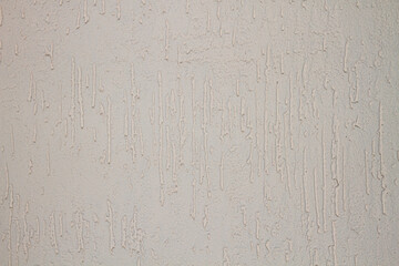 the texture of a plaster or wall with small indentations.6