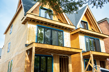 in construction wood frame houses with windows	
