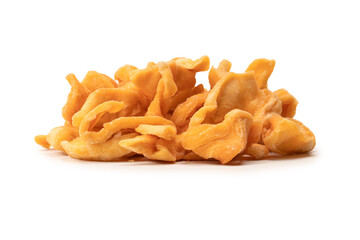 Dried melon slices isolated on a white background.