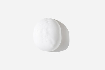 A large drop of foam. a smear of foam texture.
