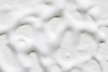  the texture of white foam over the entire background.