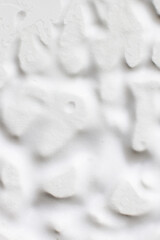  the texture of white foam over the entire background.