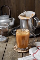 Hot drink tea with milk Malay called Teh Tarik is a popular breakfast drink in Malaysia