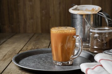 Hot drink tea with milk Malay called Teh Tarik is a popular breakfast drink in Malaysia