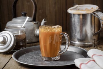 Hot drink tea with milk Malay called Teh Tarik is a popular breakfast drink in Malaysia