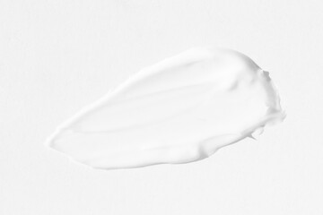 large smears of white cosmetic cream. The texture of the cream close-up.