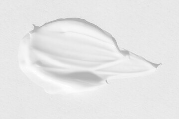 large smears of white cosmetic cream. The texture of the cream close-up.
