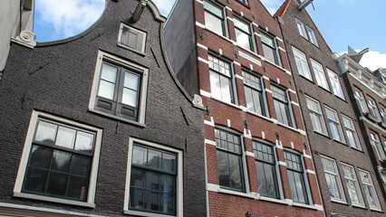 old brick houses or flat buildings in amsterdam (the netherlands) 