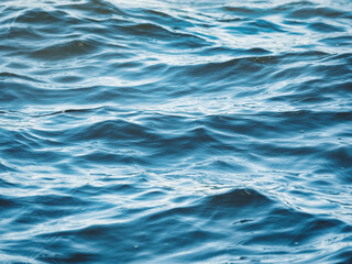 Naklejka premium Blue sea water ripples texture background.