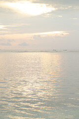 Fototapeta premium Lombok and Gili Air islands, overcast, cloudy day, sky and sea. Sunset, sand beach.