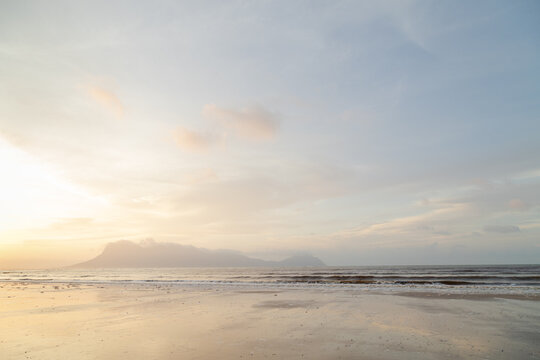 Bako national park, sea sandy beach, overcast, cloudy sunset, sky and sea, low tide. Vacation, travel, tropics concept, Malaysia