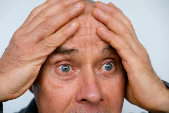 mature man, senior 60 years old crying from physical or moral pain, moral suffering elderly person wrinkles on face, age-related skin changes, aesthetic injection cosmetology, anti-aging procedures