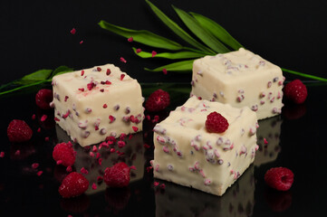 cake with chocolate mousse and raspberries in white chocolate