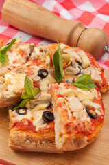 italian vegetarian pizza with zucchini mushrooms olives and cheese