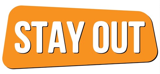 STAY OUT text on orange trapeze stamp sign.