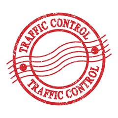 TRAFFIC CONTROL, text written on red postal stamp.