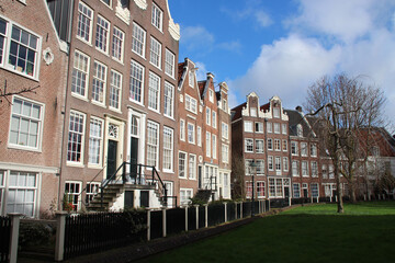 old brick houses at a beguinage (begijnhof) in amsterdam (the netherlands) 