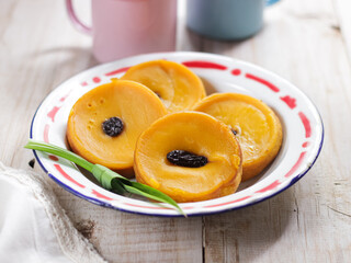 Kue Lumpur Labu Kuning, Indonesian traditional cake made from pumpkin, flour, coconut oil and eggs