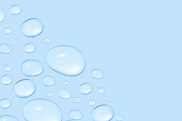 Drops of transparent gel or water in different sizes. On a blue background.