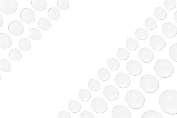 Drops of clear gel or water in rows. On a white background.