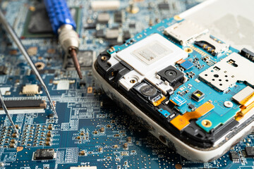 Repairing and upgrade mobile phone, electronic, computer hardware and technology concept.