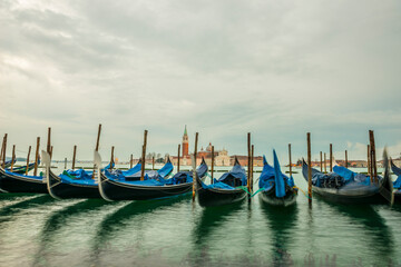 Fototapeta na wymiar Gondola In Front Of Island San Giorgio Maggiore in Venice, Veneto, Italy.