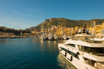 Port with Luxury Yachts and Cityscape over Monte Carlo in a Sunny Day in Provence-Alpes-Côte...