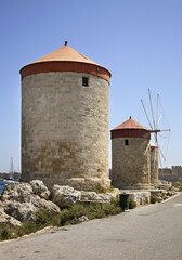 Fototapeta na wymiar Windmills in Rhodes city. Rhodes island. Greece