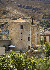 Fototapeta na wymiar Old tower in Ano Symi. Greece