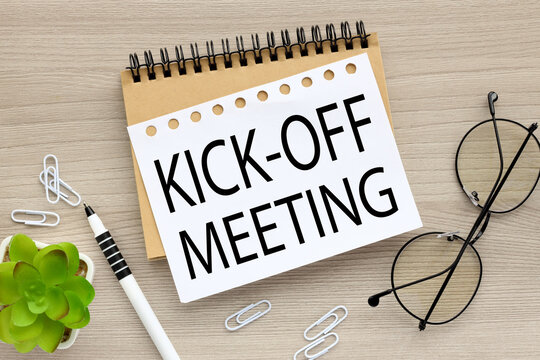 Kick-off meeting Message . Concept Image. working table and potted plant