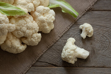 Organic cauliflower on wooden background, Fresh cauliflower on wooden table, top view