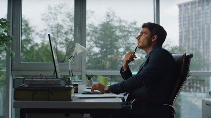 Office employee searching ideas considering business problems at workplace.