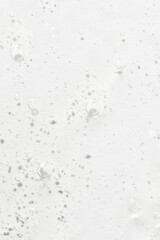 The texture of the serum or gel. Transparent cream with bubbles in the background. Transparent cosmetic gel in close-up. .Oxygen bubbles. .