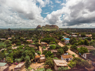 Fototapeta na wymiar Drone shot of rock formation that looks like a face in a small rural town in Mozambique.