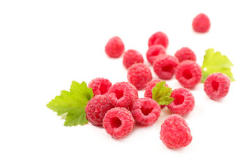 fresh raspberries and leaves isolated on white background