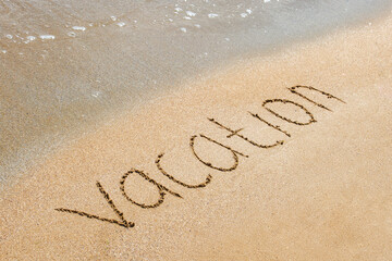 Vacation writing in the sand
