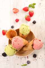 pistachio and strawberry ice cream cone