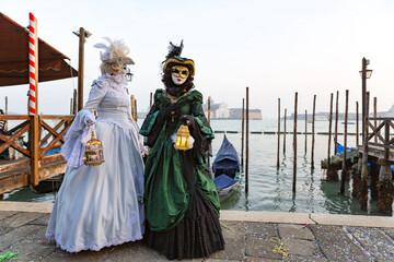 Fototapeta na wymiar Gorgeous image of carnival masks in Riva degli Schiavoni, Venice